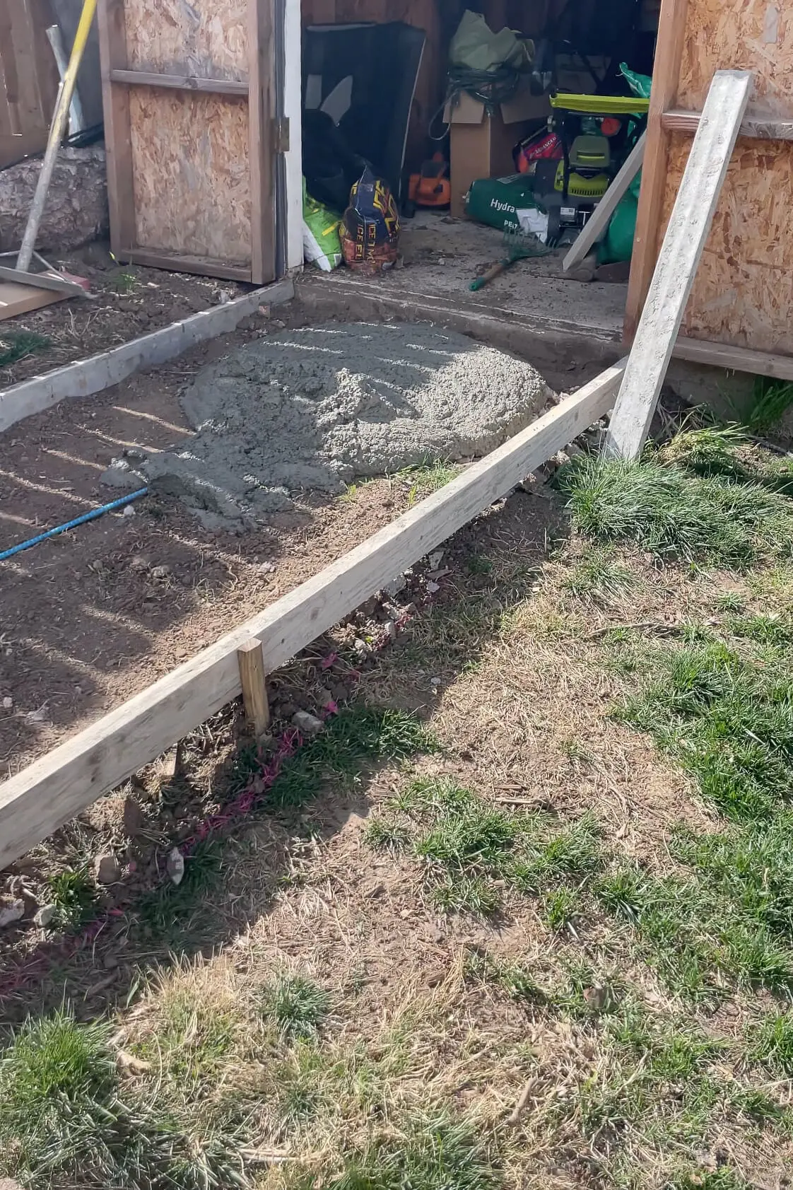 Beginning of concrete sidewalk.